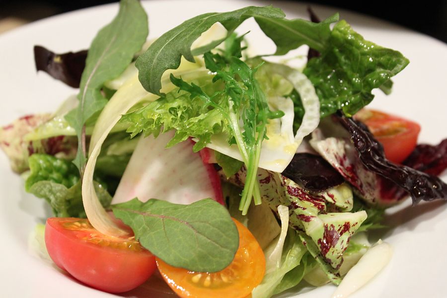 Salad of leafy greens and tomatoes